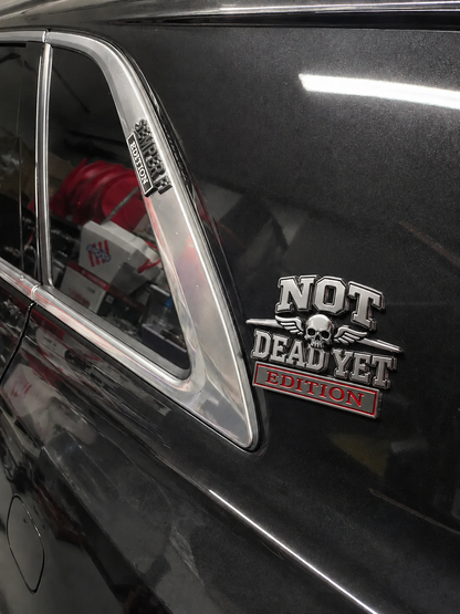 🔥Father's Day Hot Sale☠️Not Dead Yet Edition Car Emblem Metal Decorative Badge